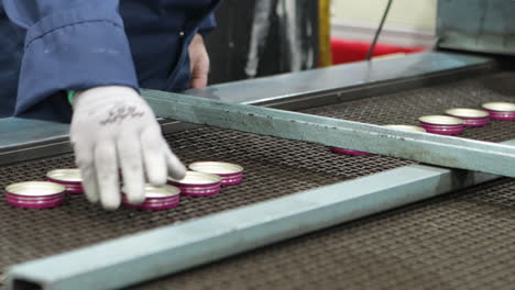 production technician inspecting products during manufacturing