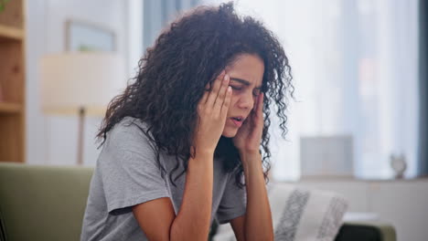 woman experiencing headache