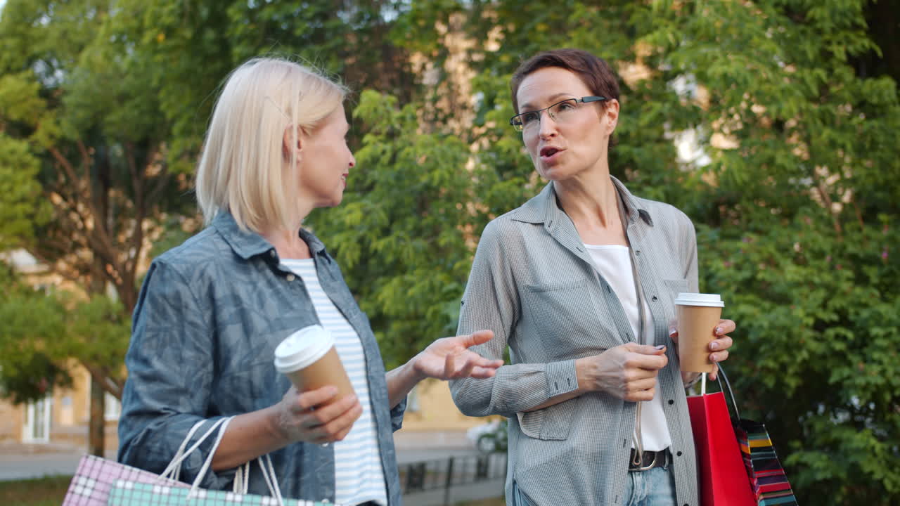Two Women Talking and Shopping