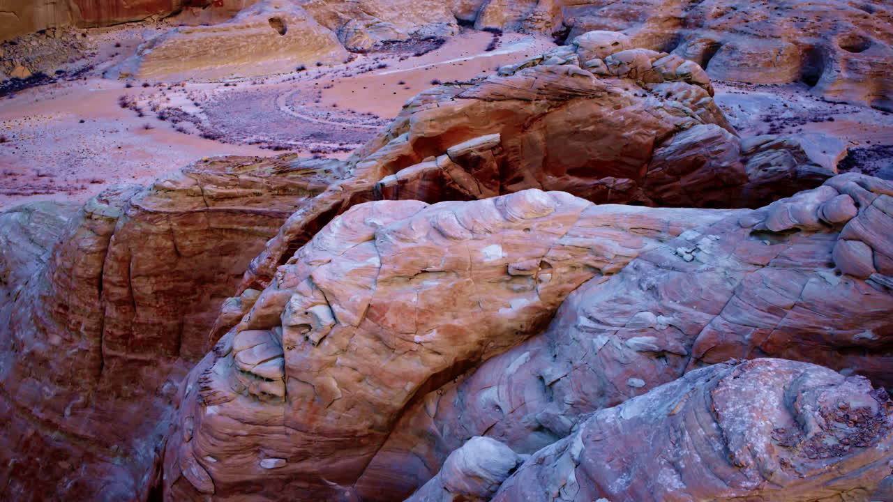 The aerial view gracefully encircles Glen Canyon, offering a stunning perspective of its rugged terrain.