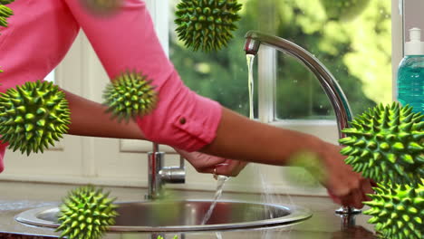 animation of macro coronavirus covid-19 cells spreading over woman washing her hands