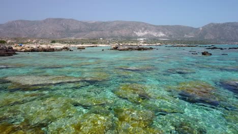 aerial drone panoramic view video of famous exotic paradise sandy deep emerald beach of elafonissi in south west crete island, greece