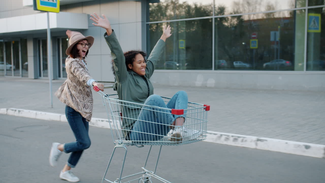 Two Friends Having Fun in a Shopping Cart