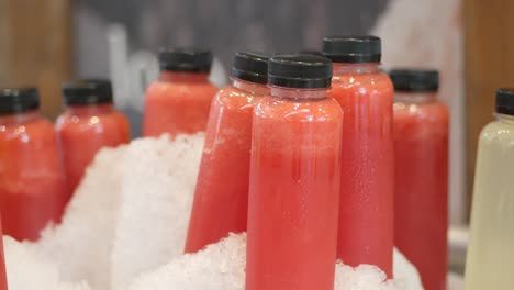 Plastic-bottles-of-soft-drink-on-table