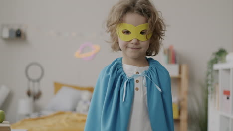 child dressed as superhero