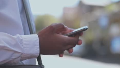 Hands,-business-city-and-typing-on-phone