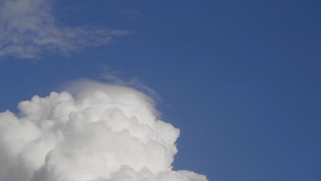 fluffy white clouds in a blue sky