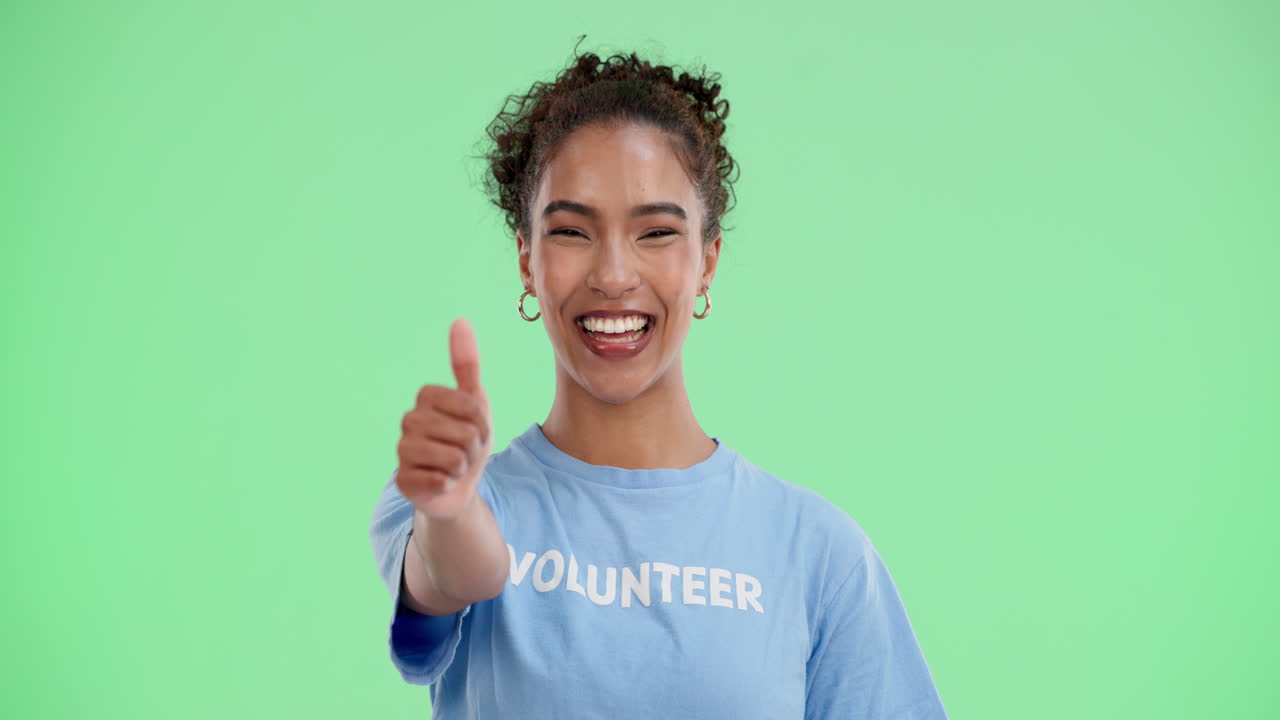 Volunteer giving a thumbs up