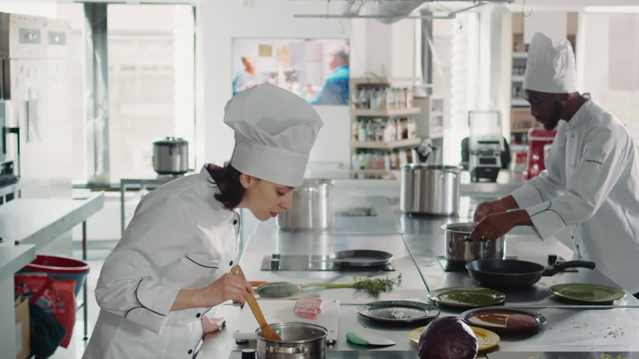 Woman working as cook testing bad soup for gourmet dish