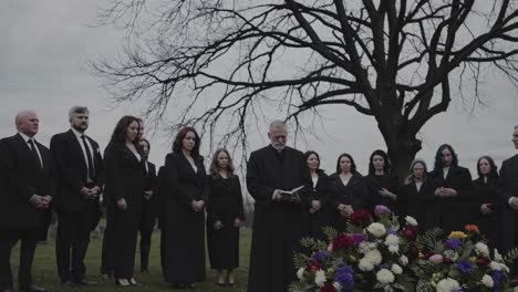 funeral service at cemetery