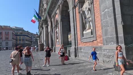 visitors explore the royal palace exterior