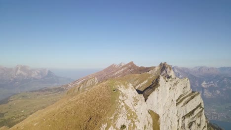 camera flies far away to show the huge mountain