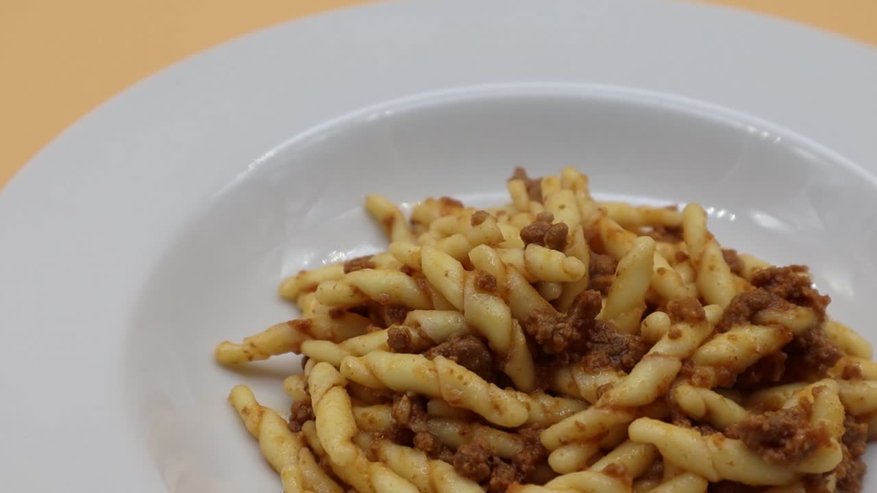 Trofie, italian pasta with bolognese sauce