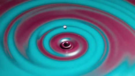 abstract teal and magenta liquid ripple swirl
