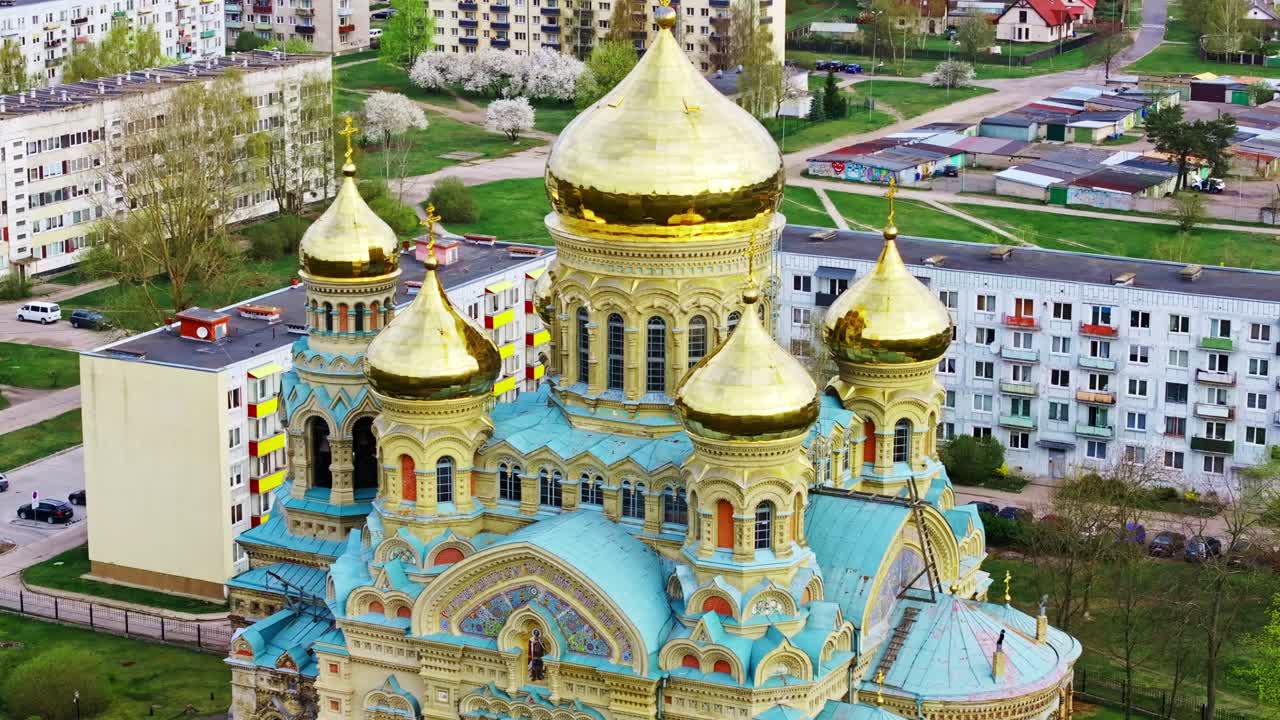 Aerial View of a Stunning Cathedral with Golden Domes