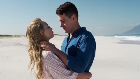 couple in love enjoying free time on the beach together