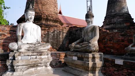 buddha statues in ayutthaya, thailand, near ancient pagoda