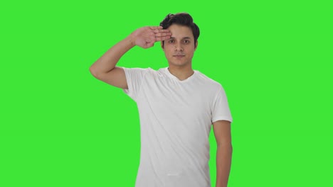 proud indian man saluting on camera green screen