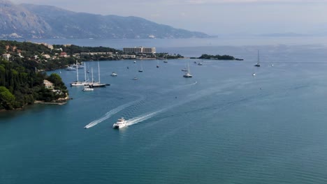 beautiful bay in corfu island greece ships boats and catamarans