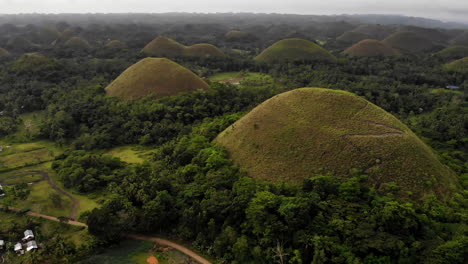 aerial tracking view chocolate hills in bohol, philippines 4k