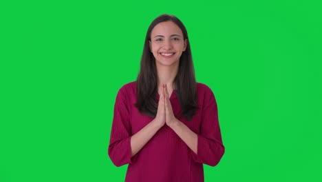 happy indian woman doing greeting and namaste green screen