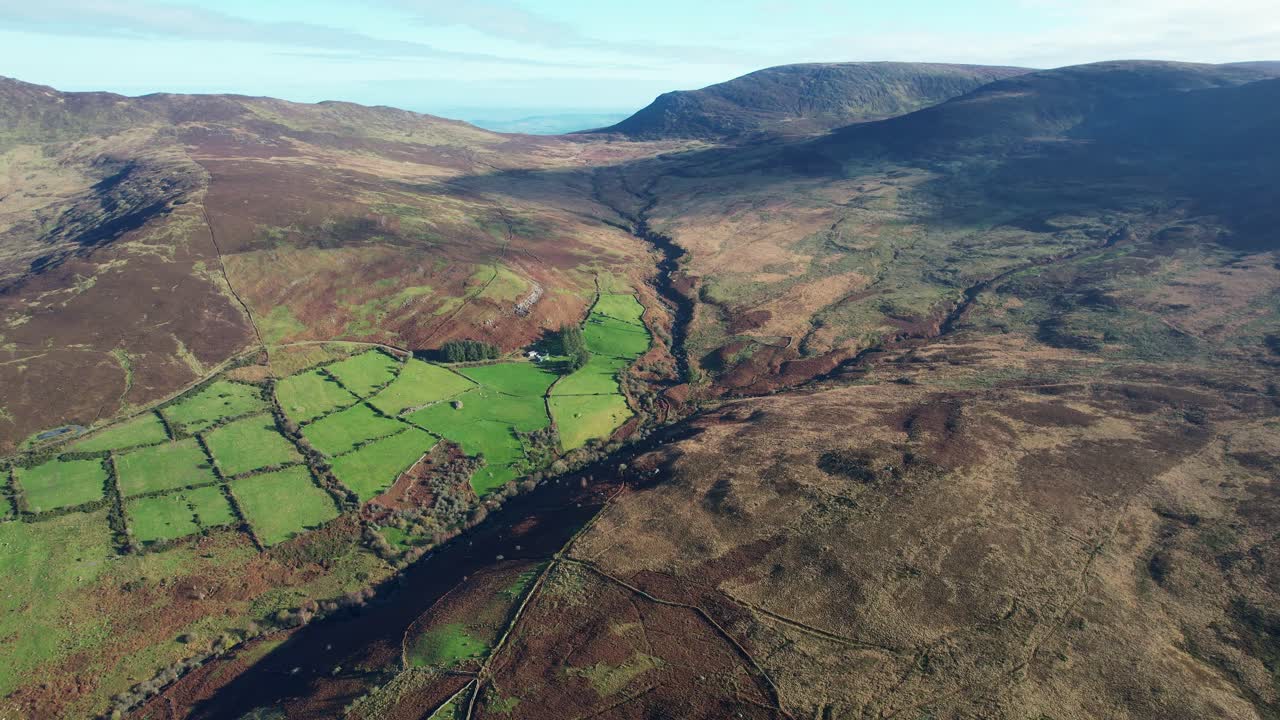 Ireland drone views beautiful Waterford epic view of Nire valet where farmland meets mountain autumn morning
