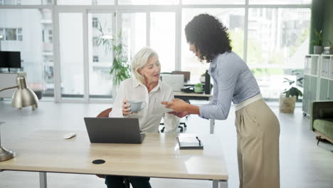 businesswoman working on laptop in office