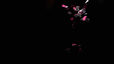 animation of hearts falling over black background