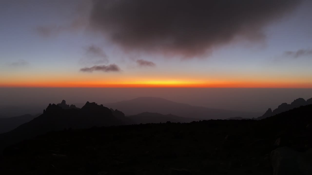 Majestic Sunset over Volcanic Mountains