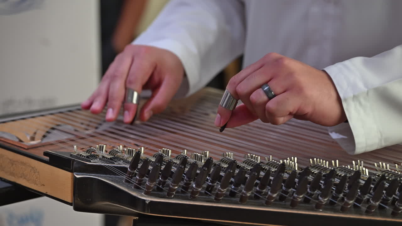 The qanun’s shimmering tones fill the air as an Arab artist brings centuries-old music to life