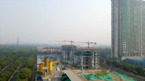 aerial drone shot capturing a massive construction site in noida india