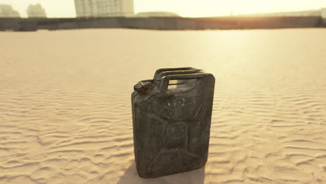 old rusted fuel can on the beach