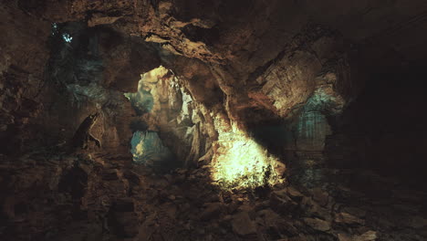 mysterious cave illuminated by natural light in rocky underground landscape