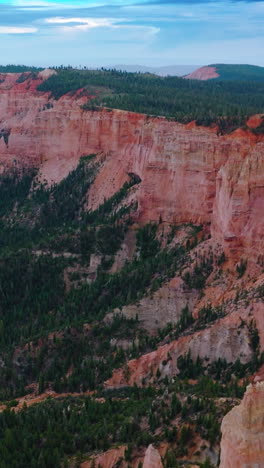 gorgeous scenery of amazing canyons with pine forest at foot. lovely blue skies at backdrop. zion canyon, utah, usa. vertical video