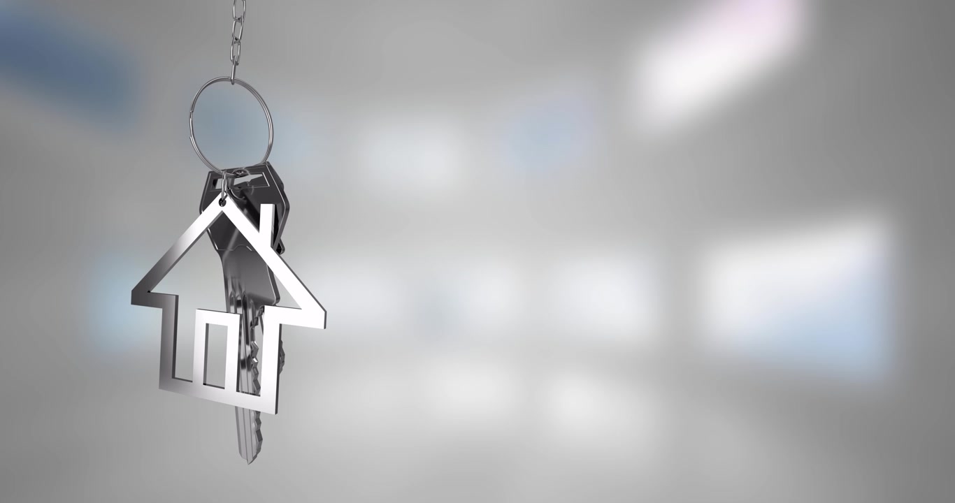 Animazione di un portachiavi a forma di casa su sfondo sfocato con luci fluttuanti