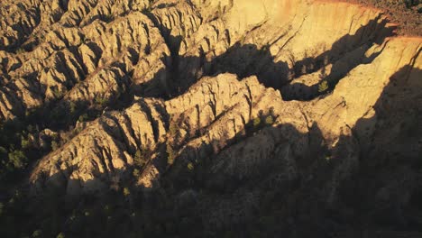 desert mountains. badlands. aerial view. low-altitude flight. eroded mountains with strange shapes. gullies, ravines, and gorges. viewpoint of the end of the world. purullena, granada, spain