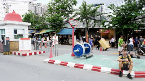 People-walk-the-vibrant-bustle-in-Bangkok's-Chatuchak-Market-with-locals-and-foreigners-shopping-in-Bangkok,-Thailand