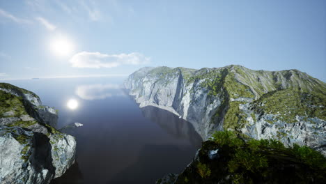 white cliffs with grass over the ocean