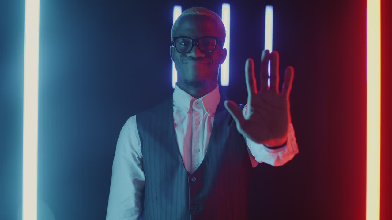 Man in Business Attire with Neon Lights