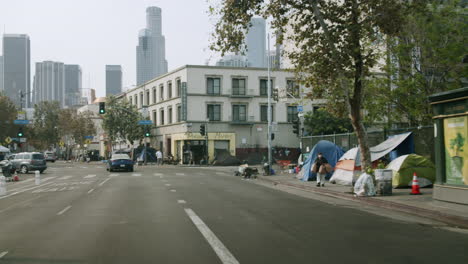 homeless encampment on a street in downtown los angeles