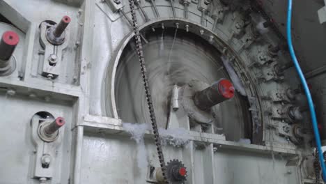 close up of intricate textile machinery in a pakistani factory, showcasing industrial precision and efficiency