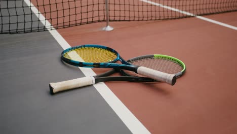 tennis rackets on a court