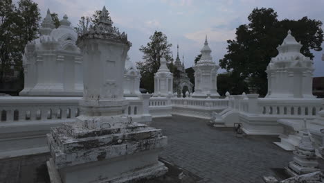 white structures at wat suan dok in chiang mai, thailand - approach