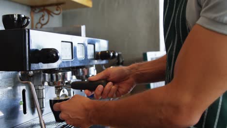 portrait of waiter is preparing a drink