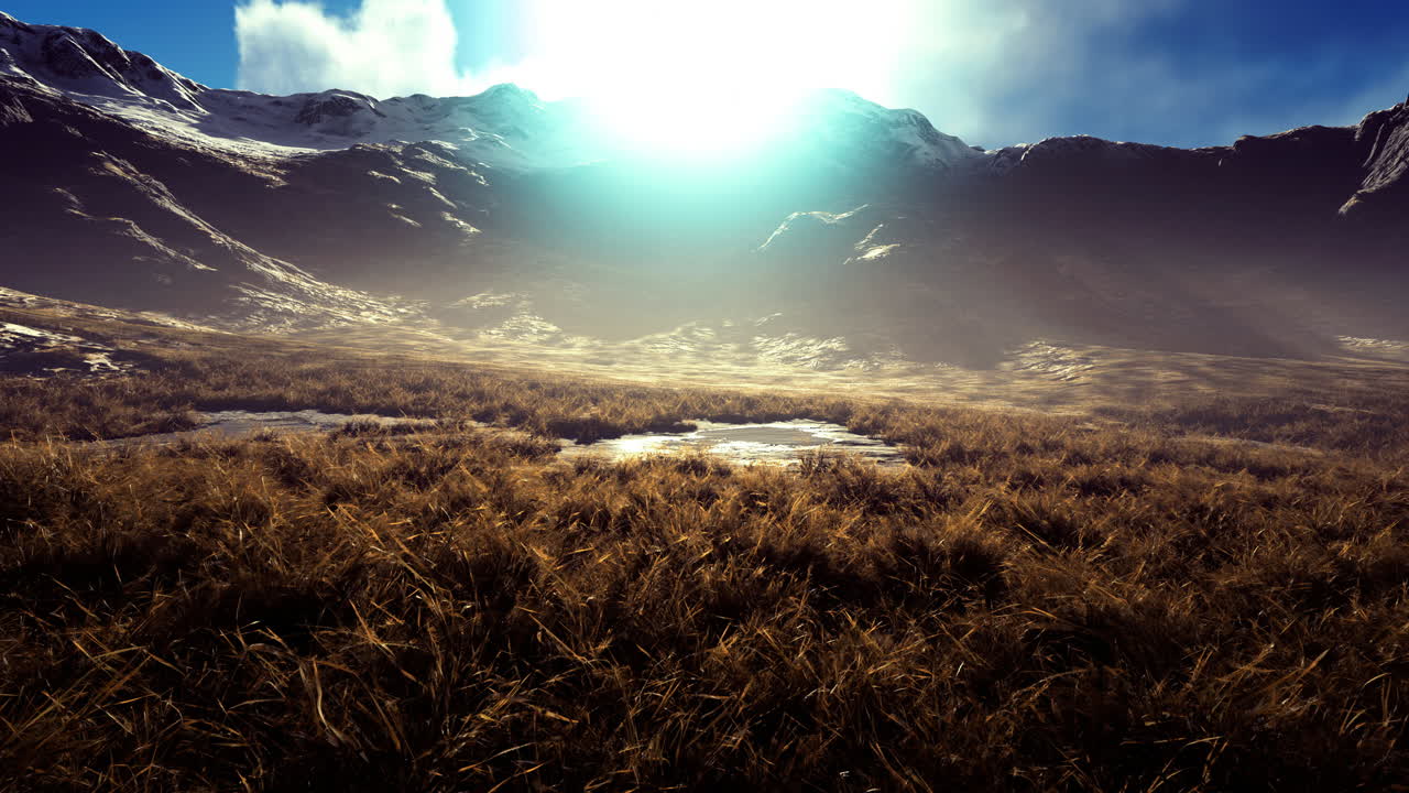 Captivating mountain landscape bathed in golden sunlight during sunrise