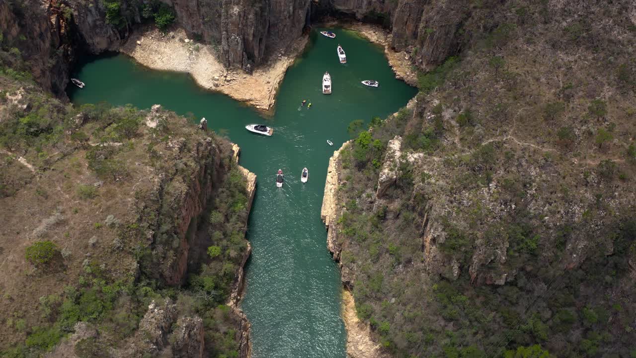 A serene waterway surrounded by rocky cliffs in paraiso achado, brazil, aerial view