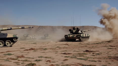 tanks in a desert military exercise