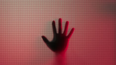 hand sliding down window dying in red light murder concept