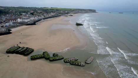 aerial view of world war two mulberry harbor bunker remnants and ruins in arromanches les bains normandy france