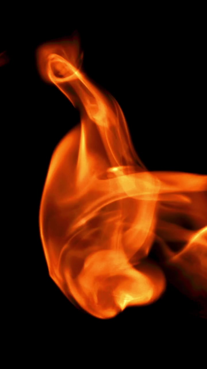 Vibrant Abstract Fire Flames Flowing on a Dark Background